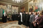 Сотрудники Московской Патриархии поздравили Святейшего Патриарха Кирилла с 65-летием со дня рождения